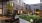 a courtyard with tables and chairs